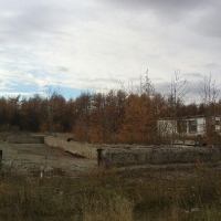 Склады, а справа парк